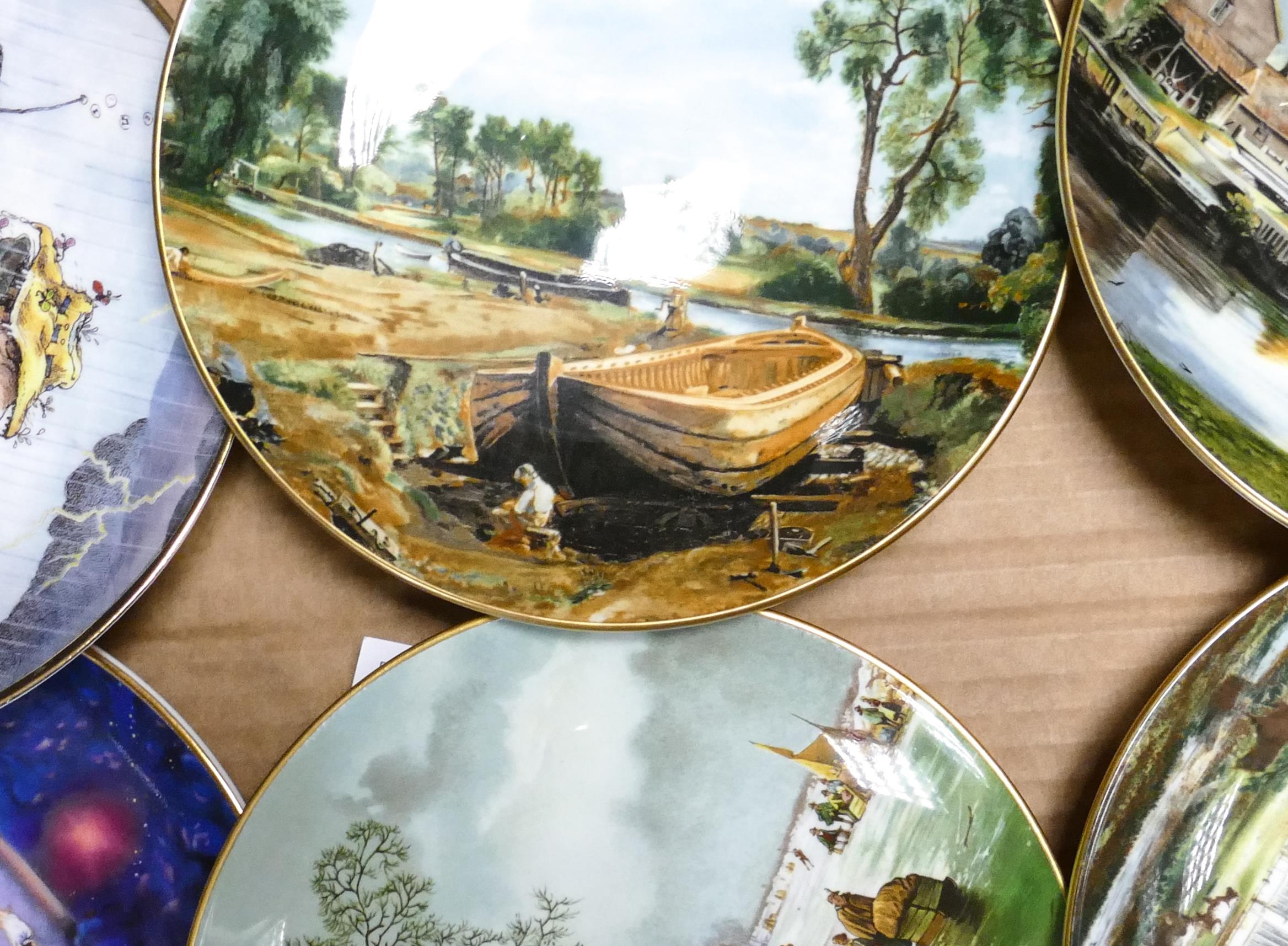 A collection of six decorative wall plates to include Royal Doulton Dragon Master, Danbury Mint