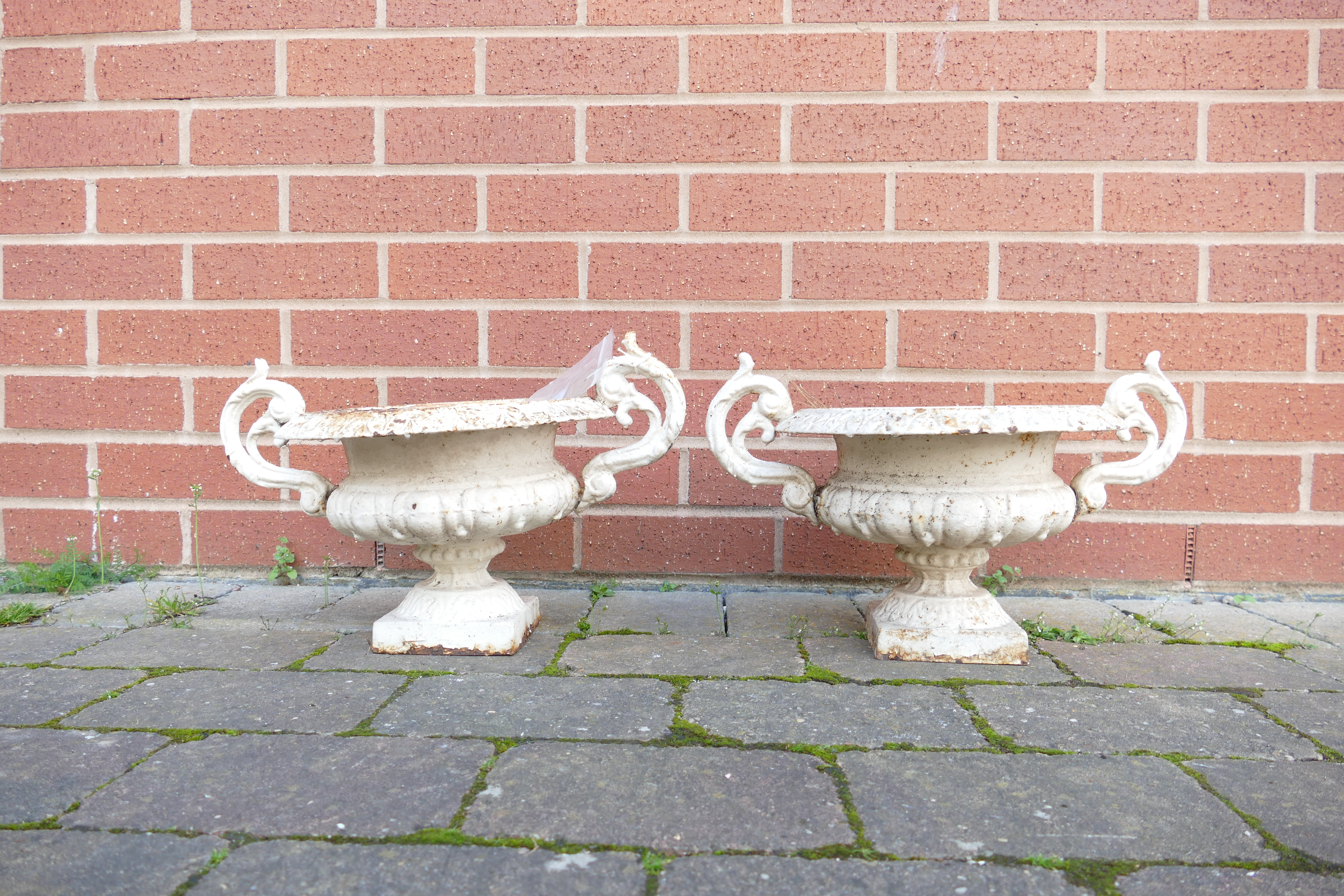 Pair of cast iron garden planters, 42cm x 25cm high appx.