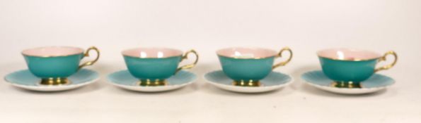 Four Handpainted Susie Cooper Teacups with Four Saucers. Three of the Saucers are damaged and re-
