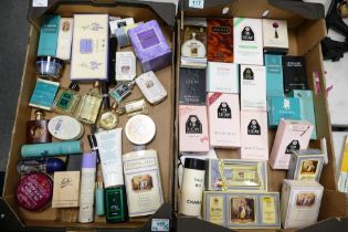 A large collection of partially used & sealed Perfumes & soaps (2 trays)