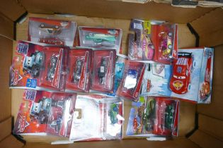 A collection of Carded Disney Pixar Cars, Tokyo Racer & Heavy Mater Cars Model toy cars (11)