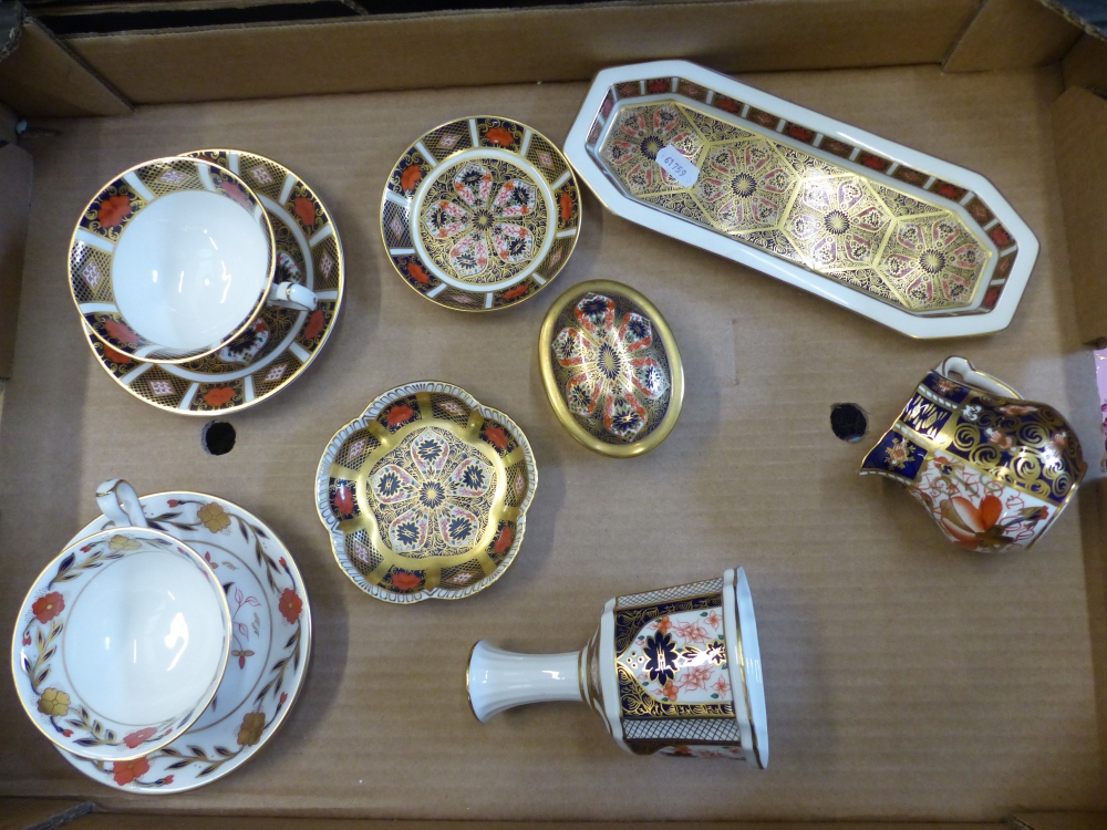 A collection of Royal Crown Derby Imari 1128 items to include tea cup and saucer, pin dishes, lidded