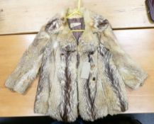 Stylish vintage ladies French fur coat by Chocquenet.