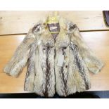 Stylish vintage ladies French fur coat by Chocquenet.