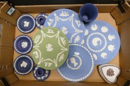 A collection of Wedgwood jasperware including Sage Green Wall Plate, Royal Blue Candlesticks, pin