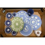 A collection of Wedgwood jasperware including Sage Green Wall Plate, Royal Blue Candlesticks, pin