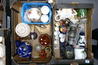 A mixed collection of items to include decorative teapots, Portmierion Botanic water jug, storm lamp