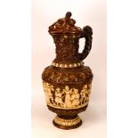 Ceramic lidded Jug with revelry scenes to body and Boar's Head to Lid - filial missing from lid -