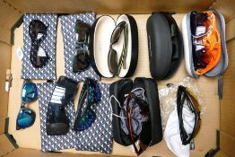 A collection of gents and ladies sunglasses to include O'Neil, Randies, Bloc, Superdry, Polar Optics