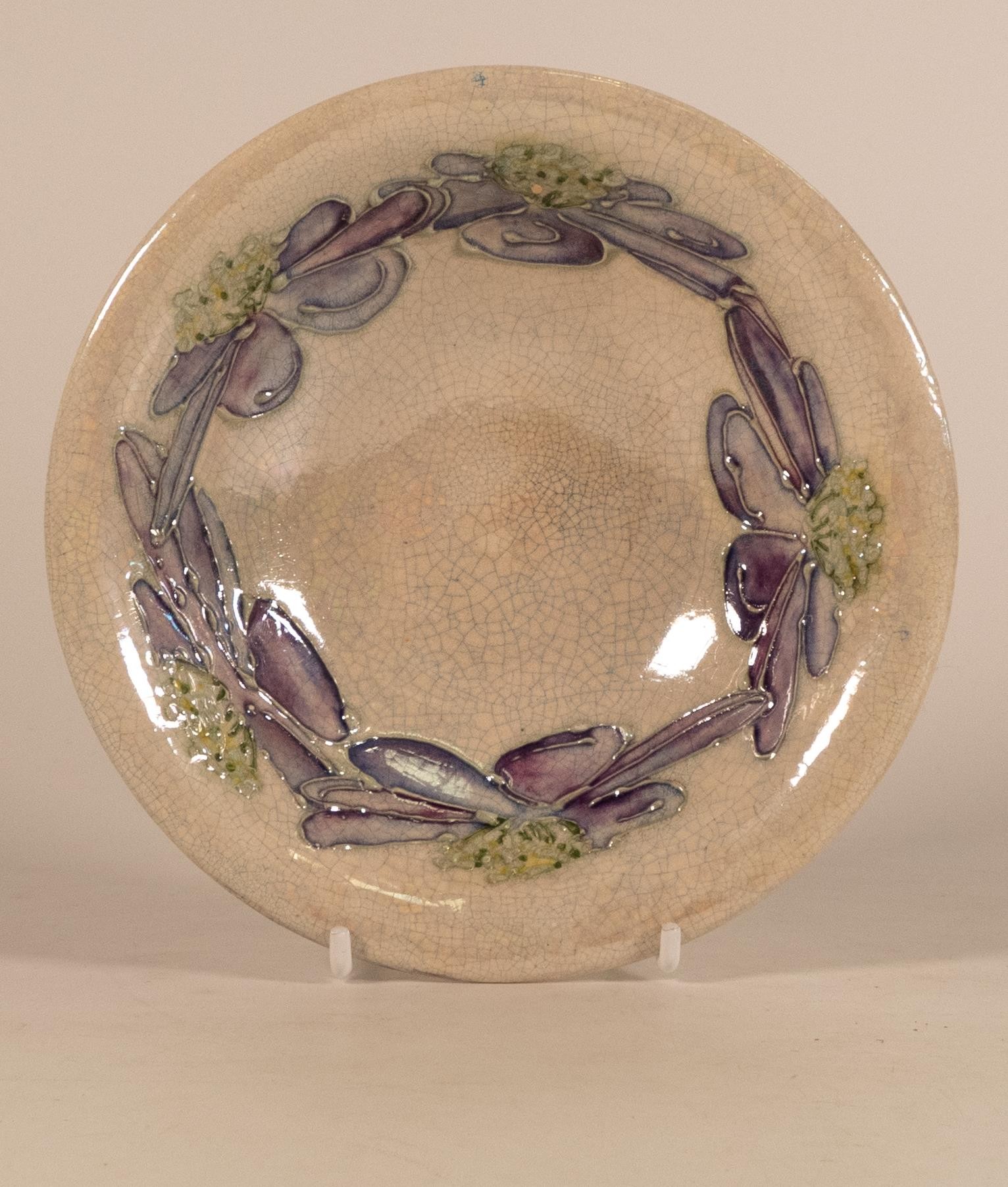 Lise B. Moorcroft small dish 2013 Artic Flower decoration, chip to rim, diameter 15.5cm