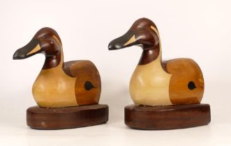 Pair of large polychrome wooden bookends modelled as ducks, 20cm high.