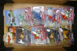 A collection of Carded Disney Pixar Planes & Planes II Disney Model toy planes (8)