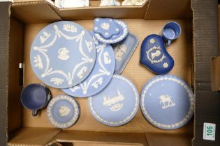 A Collection of Blue Wedgwood Jasperware including wall plates, pin dishes, tea cup etc