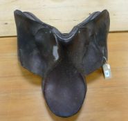 Large vintage leather horse saddle, appears in good condition.