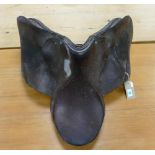 Large vintage leather horse saddle, appears in good condition.