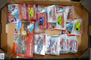 A collection of Carded Disney Pixar Cars , Disney Ice Racers Model toy cars (12)