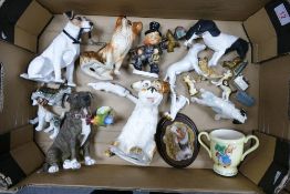A mixed collection of items to include Sylvac, Resin & similar dogs & animals