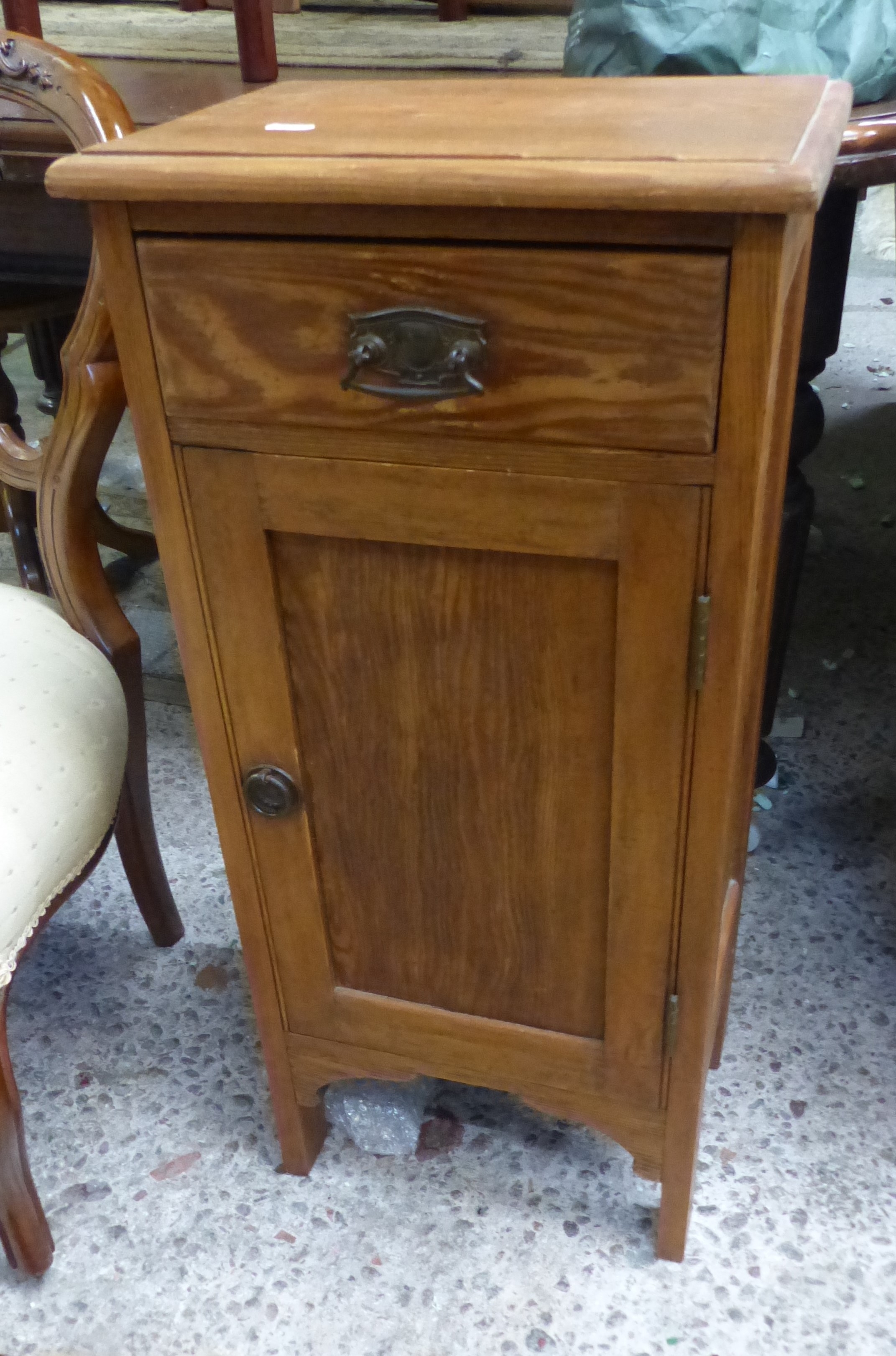 Pine one drawer one door small side cabinet 78cm H x 38cm W x 27cm D, together with a spinning chair