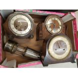 Three mid-century oak cased mantle clocks together with a steel and brass miner's lamp (4).