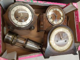 Three mid-century oak cased mantle clocks together with a steel and brass miner's lamp (4).