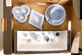 A collection of Wedgwood Blue Jasperware including Cup & Saucer Set, Pin Trays , Miniatures &