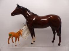 Beswick Palomino foal together with Royal Doulton Thoroughbred Stallion