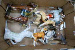 A collection of ceramic horses & animals