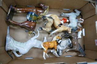 A collection of ceramic horses & animals