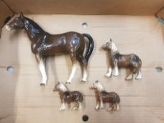 A large Sylvac horse figure together with 3 similar smaller horses (1 tray).