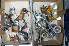 A collection of Pottery , Resin & Plastic Horses, some with carriages(2 trays)