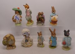 A group of 9 Beatrix Potter Figures to include Benjamin Bunny, Mrs Flopsy Bunny & Pig - Wig etc (9)