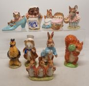 A group of 9 Beatrix Potter Figures to include Mrs Tiggywinkle, Sally Henny Penny & Peter Rabbit etc