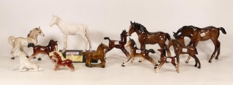 A Collection of ceramic horses to include Beswick Adventure, Beswick Foal, Beswick Shire Foal,