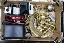 A mixed collection of items to include brass ware, instant camera etc