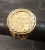 22ct gold full 1911 Sovereign in 9ct gold ring mount, ring size UK Z, overall weight 18.7g.