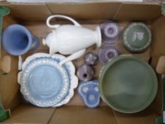 Wedgwood jasperware items to include lilac bud vase, bell and 2 candlesticks, blue and green