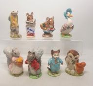 A group of 8 Beatrix Potter Figures to include Tom Kitten, Jemima Puddleduck, Appily Dappily etc (8)