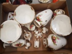 A collection of Royal Albert Old Country Roses pattern items to include planters, vases, temple jar,