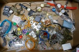 A collection of vintage costume jewellery including watches, beads, brooches, chains etc