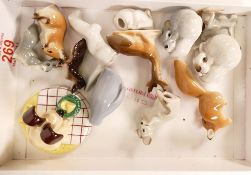 A collection of Soviet Era Made in USSR Pottery animals together with Coalport First Edition Wallace