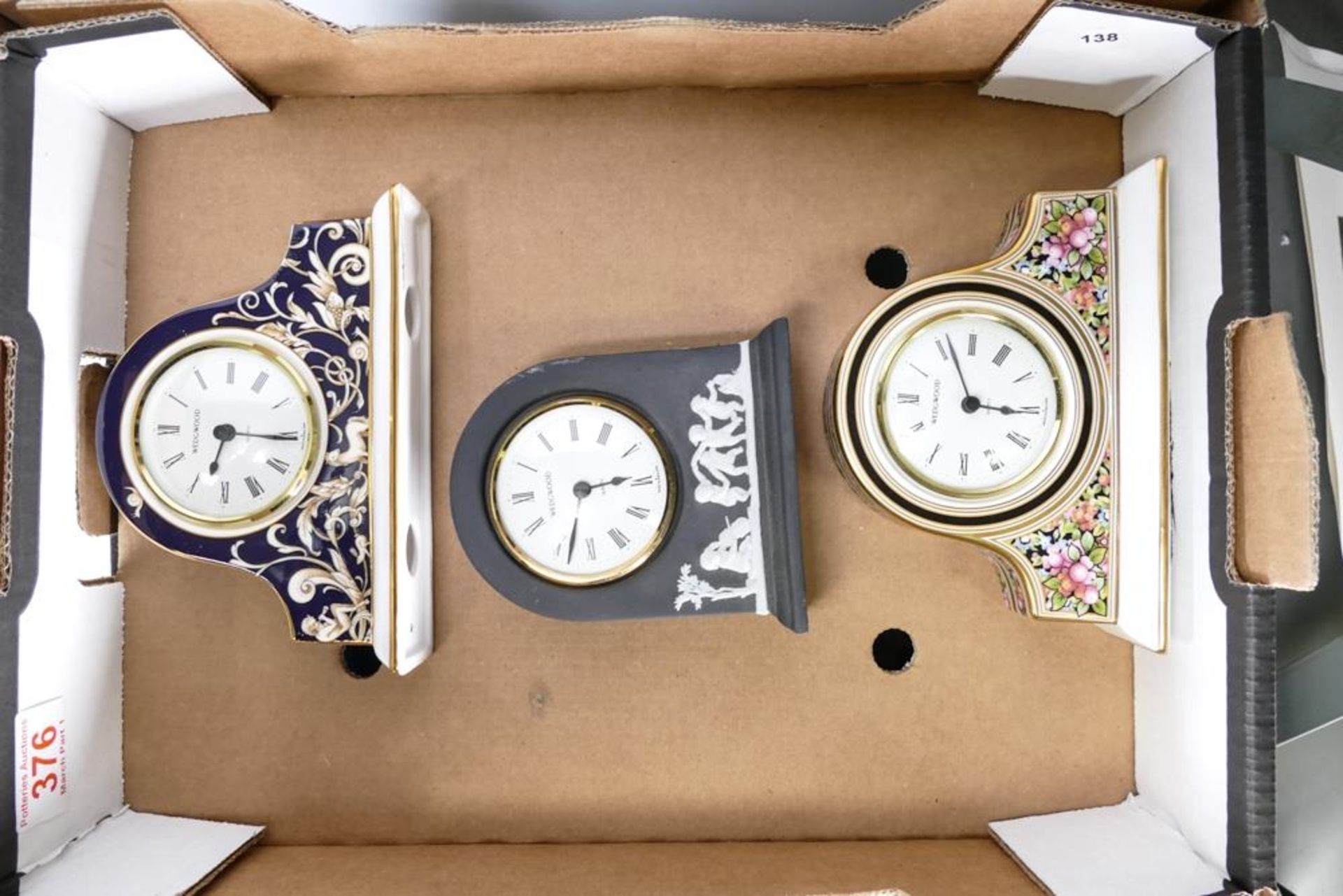 Three Wedgwood Mantle clocks including Black Basalt, Clio & Cornucopia patterns