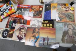 A collection of 1970's & later vinyl Lps including Simon & Garfunkel, The Commodores, Elvis, Hermans