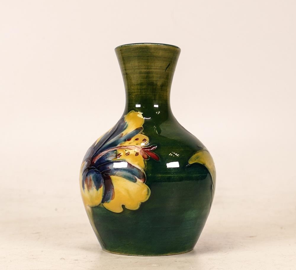 Moorcroft Small Vase in the Hibiscus Pattern on Green Ground. Height: 9cm