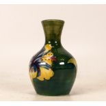 Moorcroft Small Vase in the Hibiscus Pattern on Green Ground. Height: 9cm