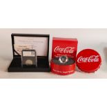 UK 2018 50p date stamp proof coin and a Coca Cola silver coin, boxed. (2)