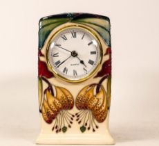 Moorcroft Mantle Clock in the Anna Lily Pattern. Red Dot Seconds. Height: 16cm