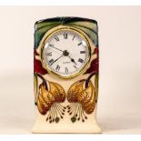 Moorcroft Mantle Clock in the Anna Lily Pattern. Red Dot Seconds. Height: 16cm