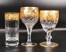 Three De Lamerie Fine Bone China heavily gilded Non Matching Glasses with Egyptian Eagle Motif,