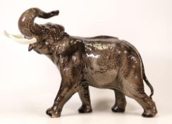 Large Beswick Model of an Elephant in Salute. Height: 30cm