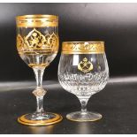 Two De Lamerie Fine Bone China heavily gilded Non Matching Wine Glasses with Saudi Arabia Crest ,